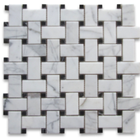 Honed Basketweave Calacatta Mosaics With Black Dots